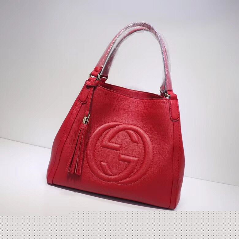G*u*i top handle bags